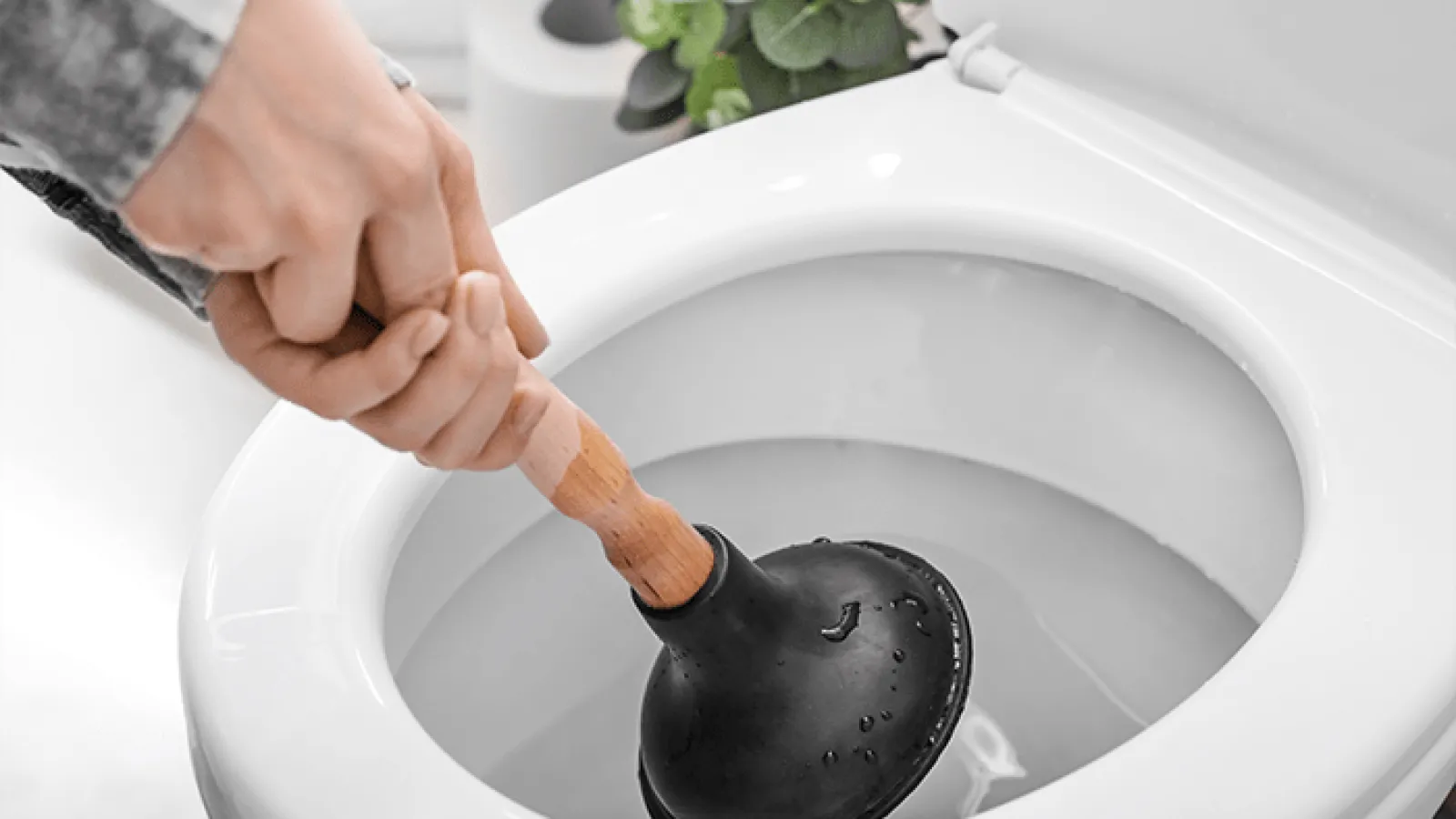 How to Unclog a Toilet Without a Plunger That Is Overflowing